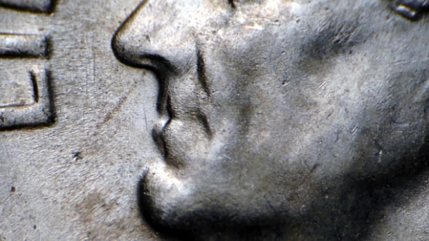 Another “Hot Lips” variety dime has been found, this one a 1955-S. Hub doubling is prominent on Roosevelt’s lips.