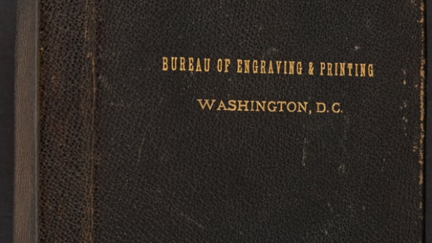 The cover of the leather-bound presentation book, and face and back of the $10,000 and $5,000 Federal Reserve Notes in the specimen set of small-size notes presented to Assistant Treasury Secretary Henry Herrick Bond on his retirement. All of the notes are printed on Crane Co. paper and are wide margin. Each carries serial No. 00000.