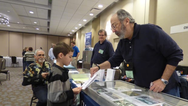 Young and old enjoyed the hunt at CPMC. At right, Steve Zitowsky of the Chicago Coin Club helps Justin Lute, who collects notes with birds on them.