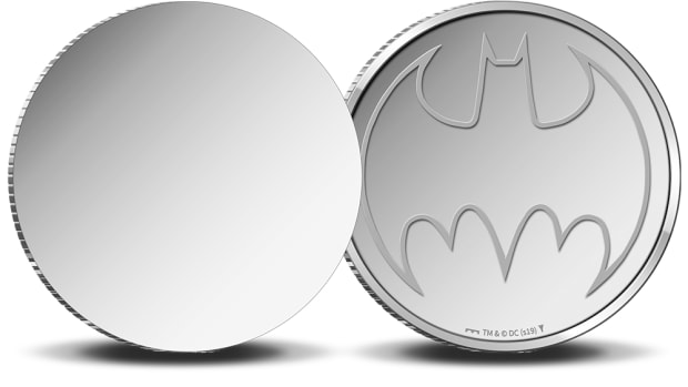 Reverse and seemingly blank obverse of Koninklijke Nederlandse Munt’s Batman stainless steel round struck to mark the masked avenger’s 80th birthday. Image courtesy Koninklijke Nederlandse Munt.