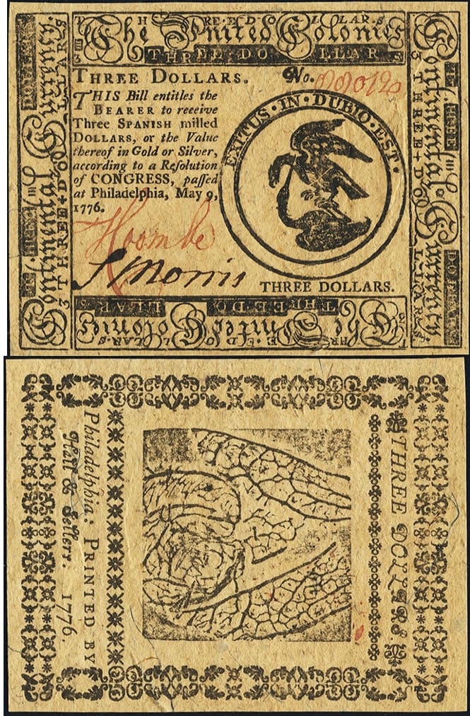 A $3 note with the image of an eagle atop a crane, including the motto Exits in Dubio Est, meaning “the end is in doubt.”