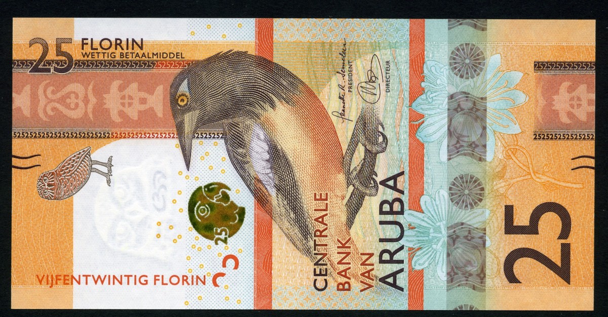 Aruba 25 florin dated 1.1.2019. Note the burrowing owl, troupial, and passion flower on the front.