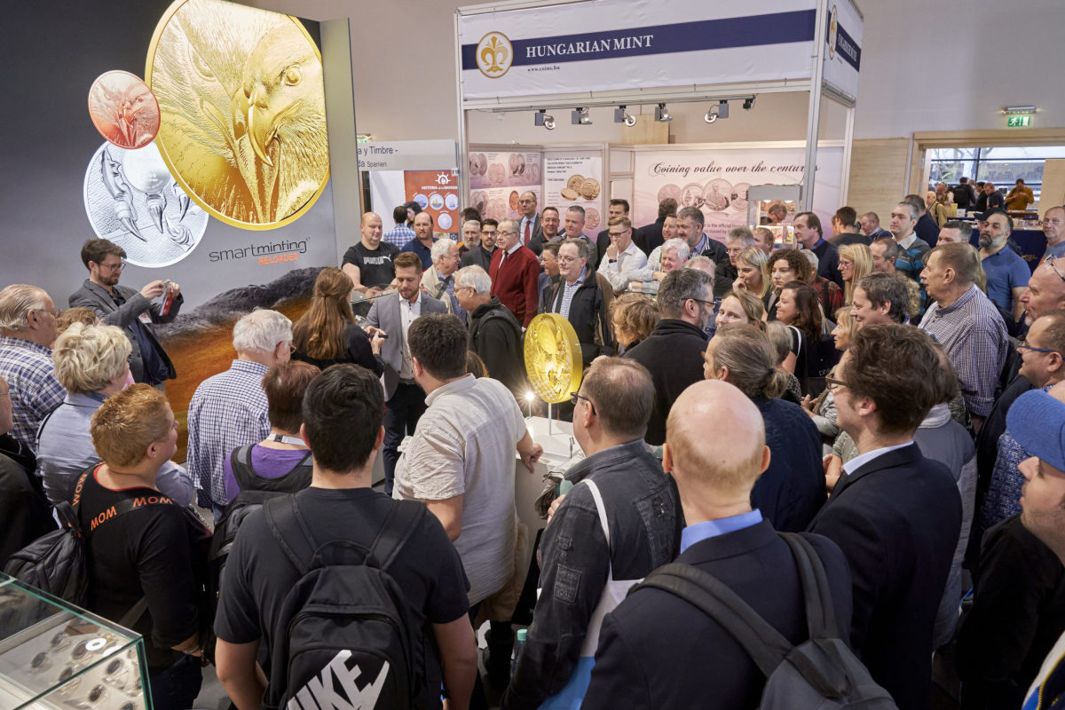 A large crowd gathered to hear the CIT Coin Invest AG announcement of Smartminting Reloaded. Most importantly, they came to see the first coins struck with this new higher relief technology. (Photo by Andreas Schoelzel, courtesy of World Money Fair.)