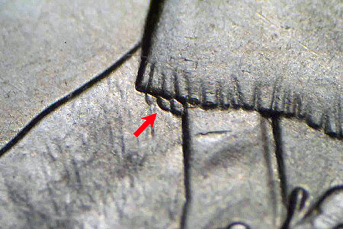 The 2016- Cumberland Gap quarter has doubling on the fringe of the buckskin coat below the right shoulder of the pioneer.