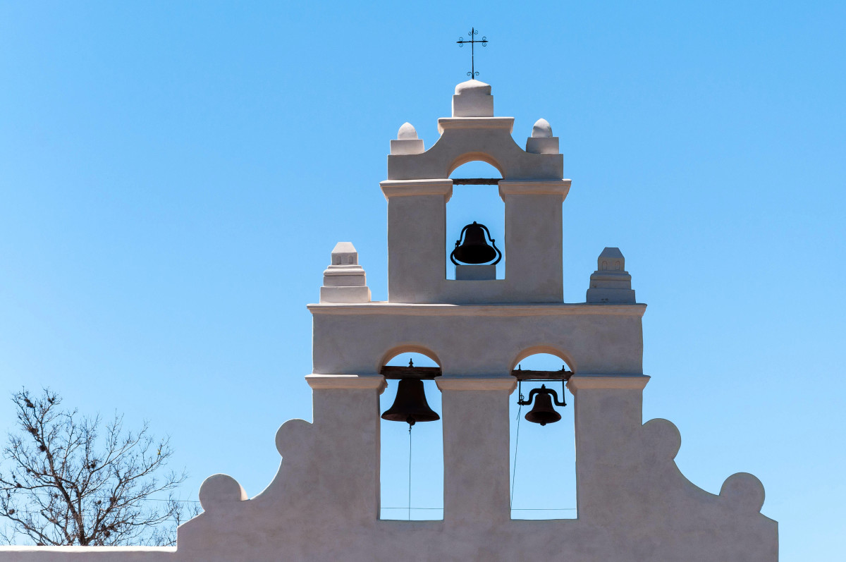 This image depicts the bell tower of Mission San Juan Capistrano in San Antonio, Texas. San Juan Capistrano was established in 1731 by Spanish colonist.