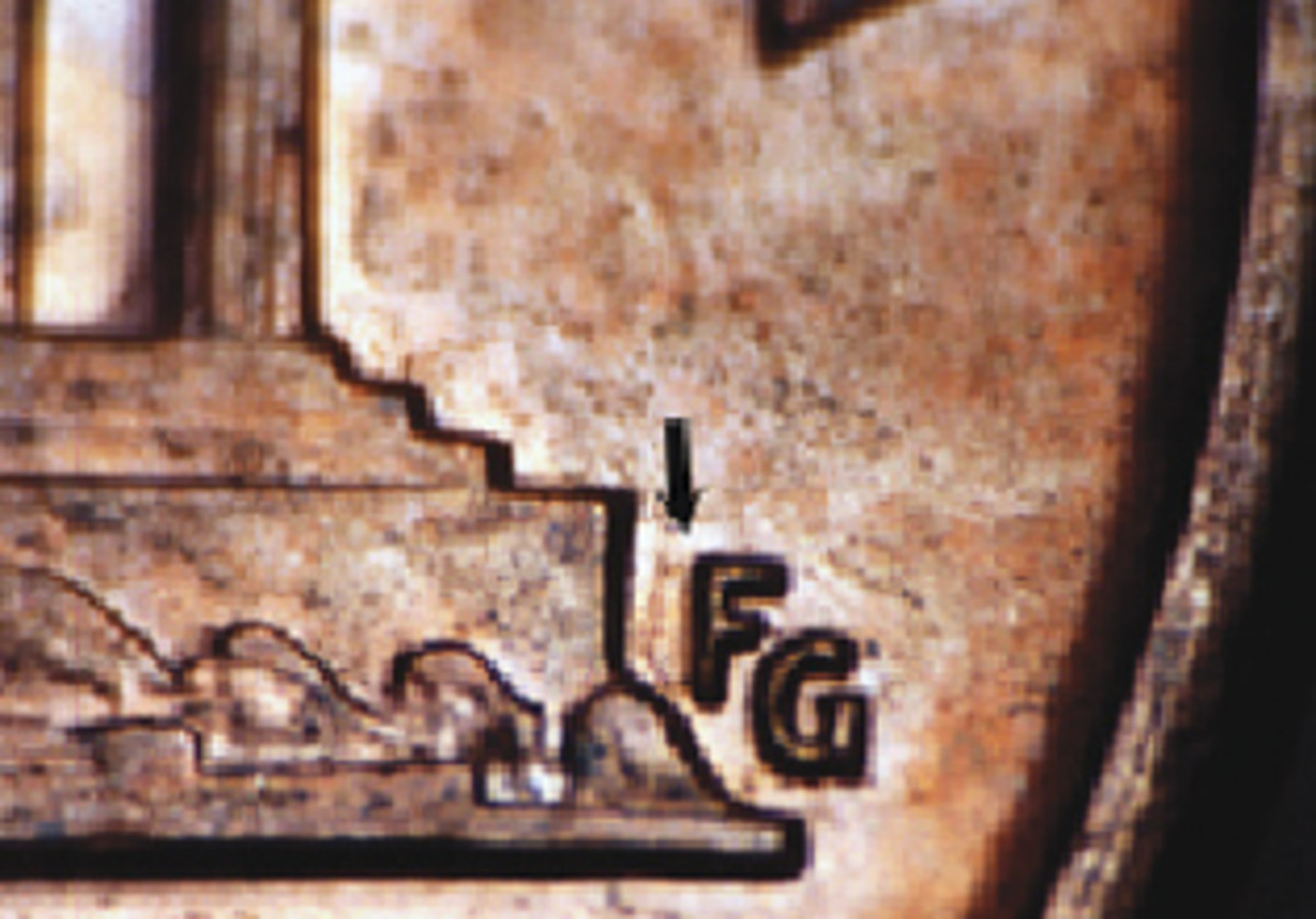  The common 1992 circulation cent Wide AM has the FG designer’s initials closer to the Memorial than on the Close AM design.