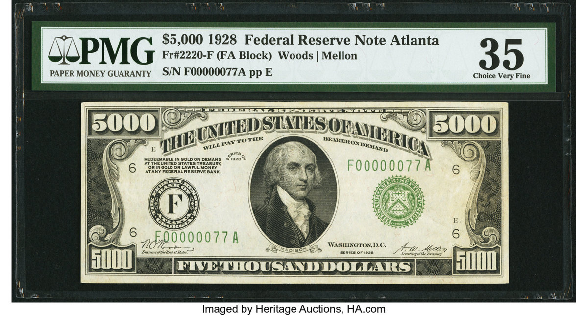 Shown is the Fr. 2221-E $5,000 1934 Federal Reserve Note graded About Uncirculated 55 by PMG.