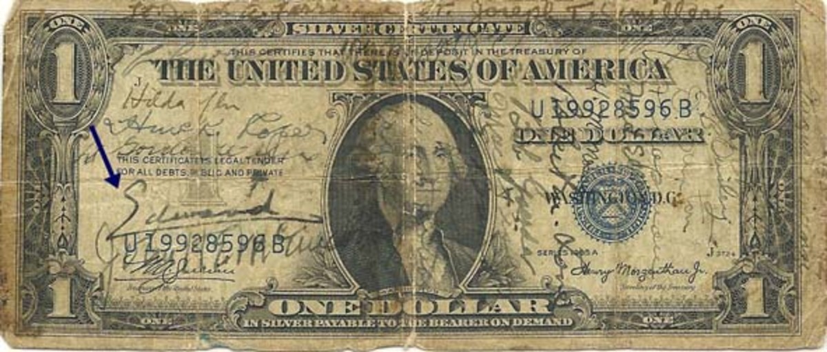  Fig. 1: This Series of 1935-A $1 Silver Certificate is covered with signatures, but the important one is that of Edward, Duke of Windsor, the former King Edward VIII of England. His signature is identified by the arrow in the photo and is genuine.