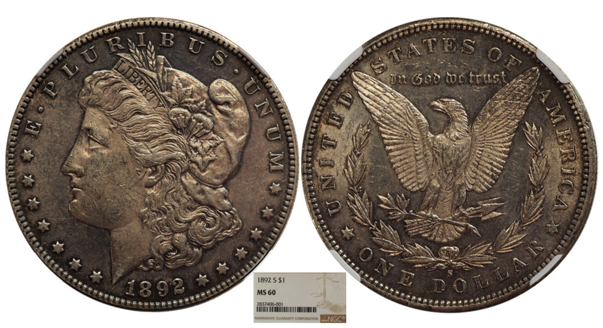 Lot 497- Certified Uncirculated 1892-S Morgan Dollar. Semi-key date that is rare in Mint State. NGC MS-60 with wholesome original toning in devices.