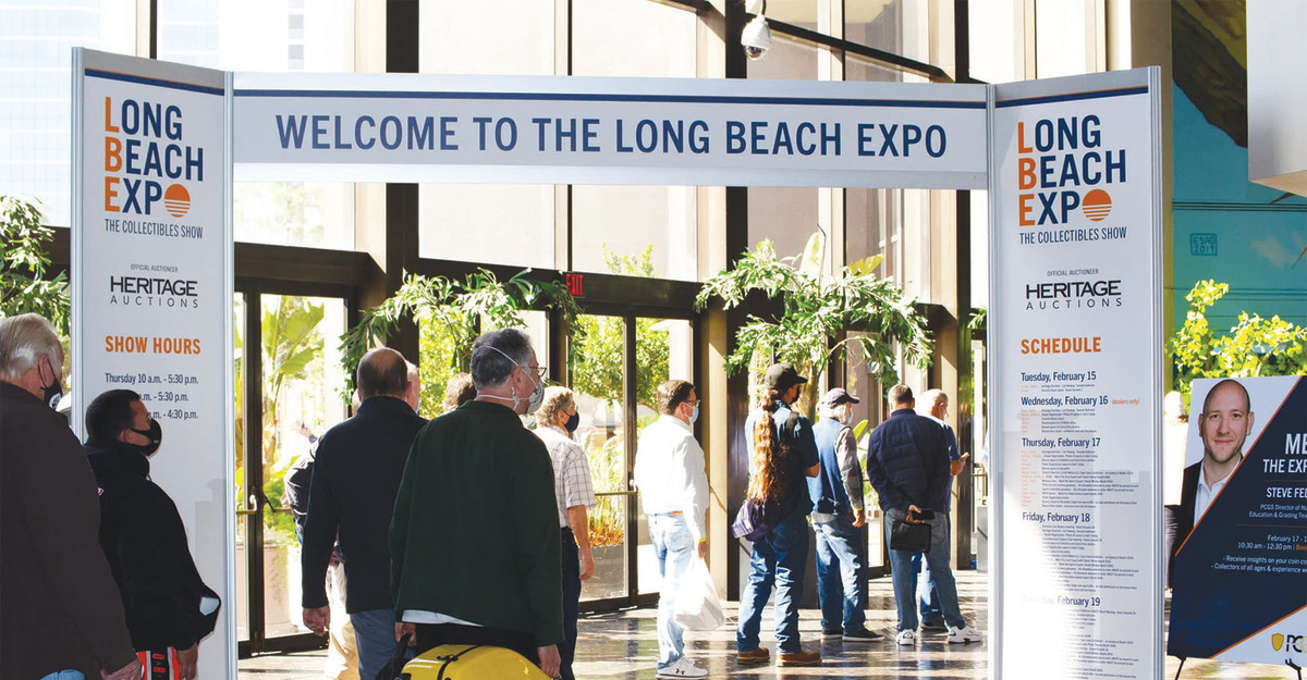 A crowd of collectors await a bourse of diverse offerings in the lobby outside the Long Beach Expo.