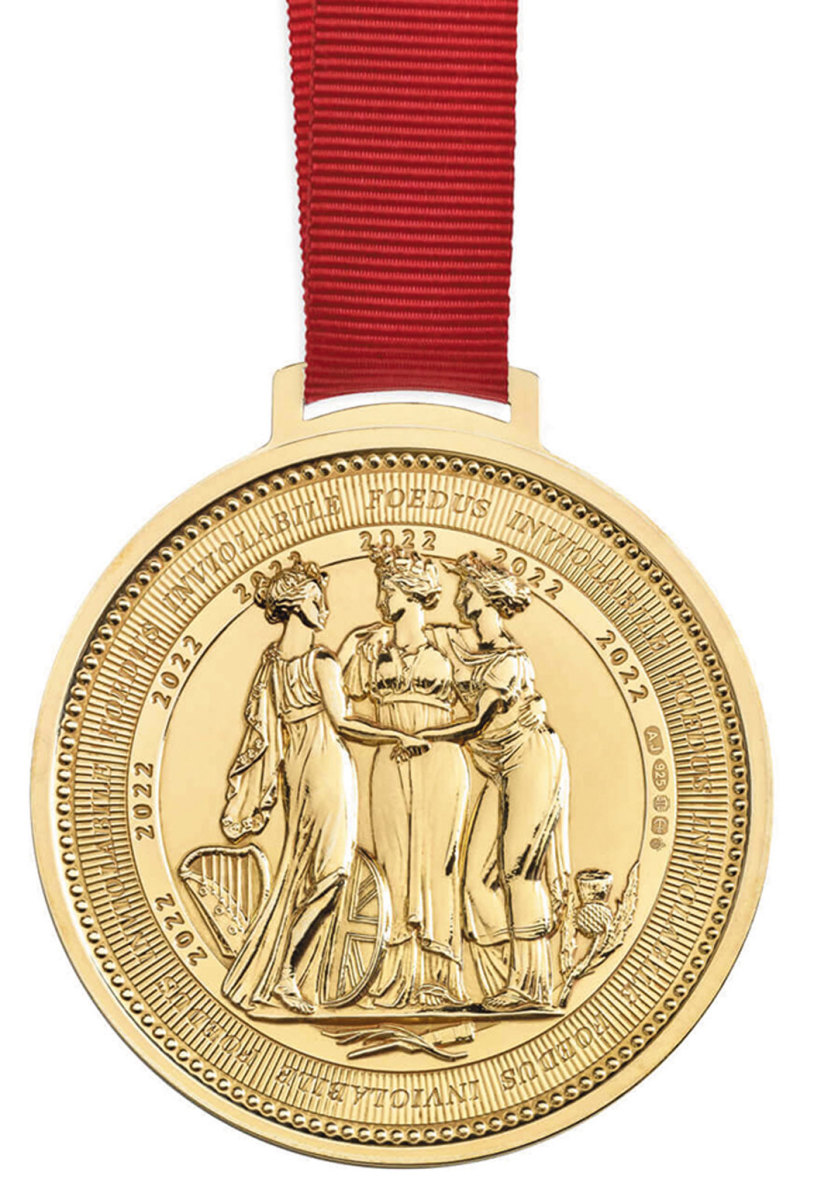 The sterling silver ornament is plated with 18-karat gold and depicts the Three Graces design by William Wyon RA. (Image courtesy The Royal Mint.) 