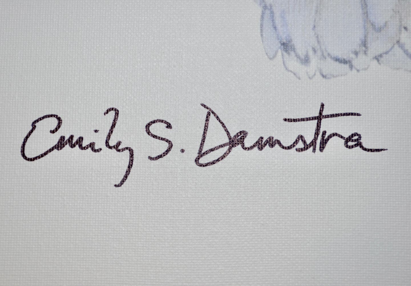 close-up-of-emily-damstra-autograph-on-artwork-dp.jpg