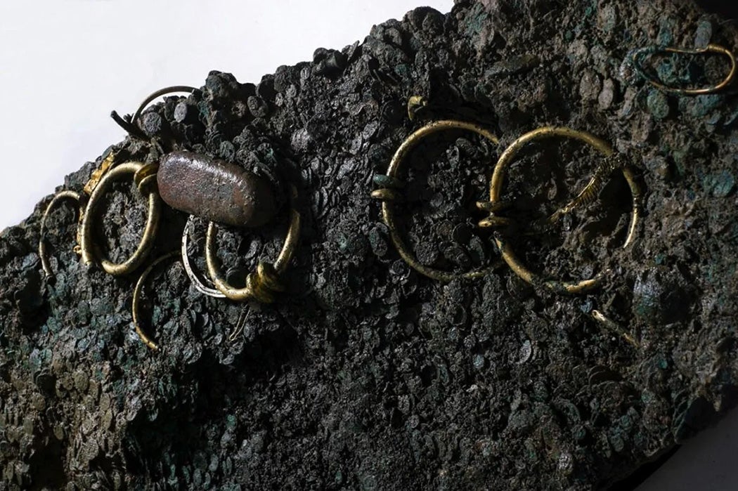 gold-torques-jewelry-among-coins.jpg